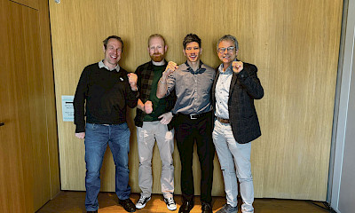 Die Verhandlungsdelegation von SEV-GATA, v. l. n. r.: Cédric Steiner, Patrick Arnold, Lawrence Yip und Philipp Hadorn.
